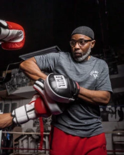 TITLE Boxing Gel Blockade Punch Mitts 19 TITLE Boxing Gel Blockade Punch Mitts -Sports Boxing gcpmc2 bk rd wh 1 4 1 1